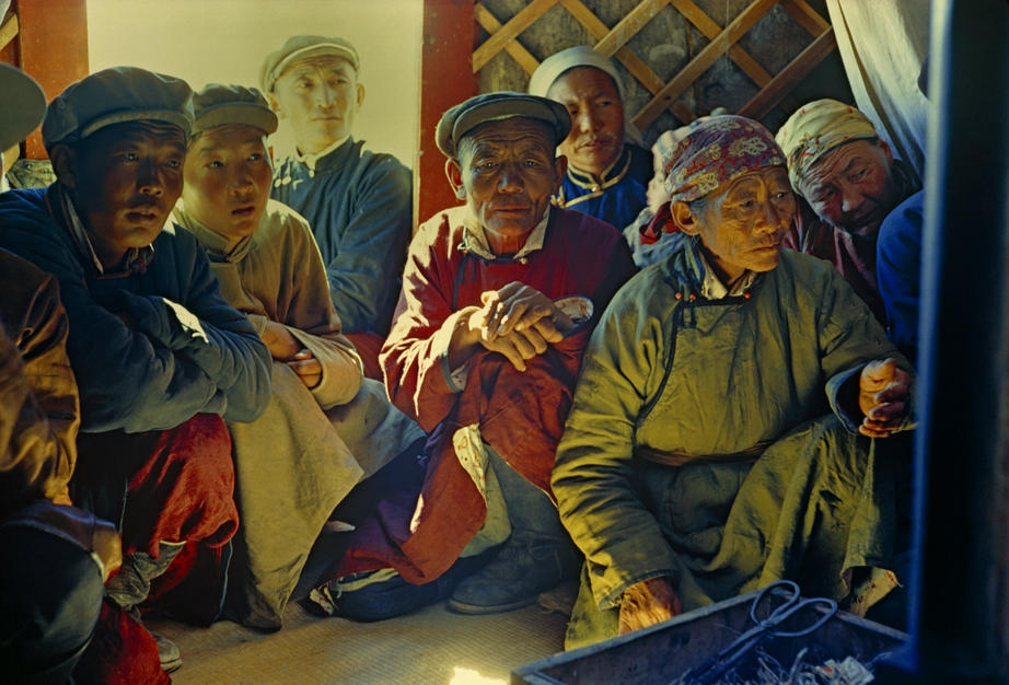 Gobi Desert dwellers listen intently to a visitor in the Gobi Desert. Mongolia. [Photo of the day - 8 DECEMBER 2011]