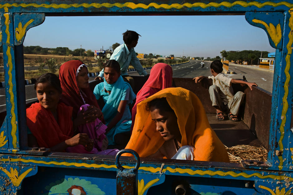 Workers travel the Golden Quarilateral Highway in Palu, Rajasthan. [Photo of the day - FEBRUARY 6, 2011]